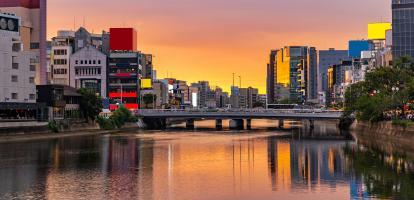 Sunset behind bridge over Naka River in Fukuoka, Japan