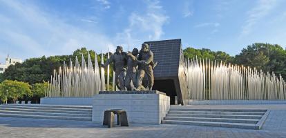 Three statues of men commemorate the democratic movement in May 18 Memorial Park in Gwangju, South Korea