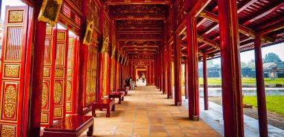 Bright colours in a hallway of the imperial Forbidden Citadel in Hue, Vietnam