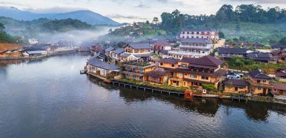 Early morning mist in the waterfront village in Mae Hong Son in Northern Thailand