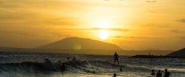 Surfing at sunset in Mui Ne