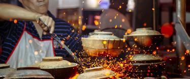 Cooking street food in Kuala Lumpur