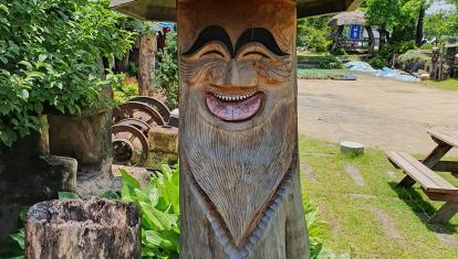 A traditional wooden sculpture with a smile in South Korea, called a Jangseung