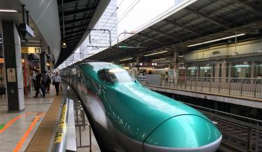 Nose of the shinkansen bullet train at a station in Japan