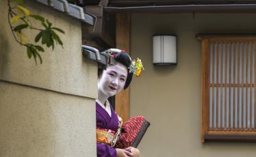 Smiling geisha in Gion