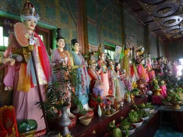 The Great Nats are represented by brightly coloured statues at Mount Popa