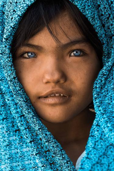 cham vietnam girl with blue eyes headscarf