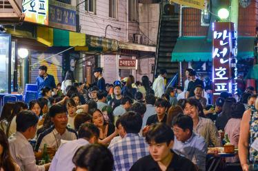 Crowds gather to have street food in Seoul's Euljiro neighborhood